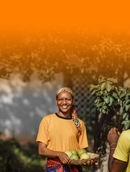 Mujer vendiendo mangos